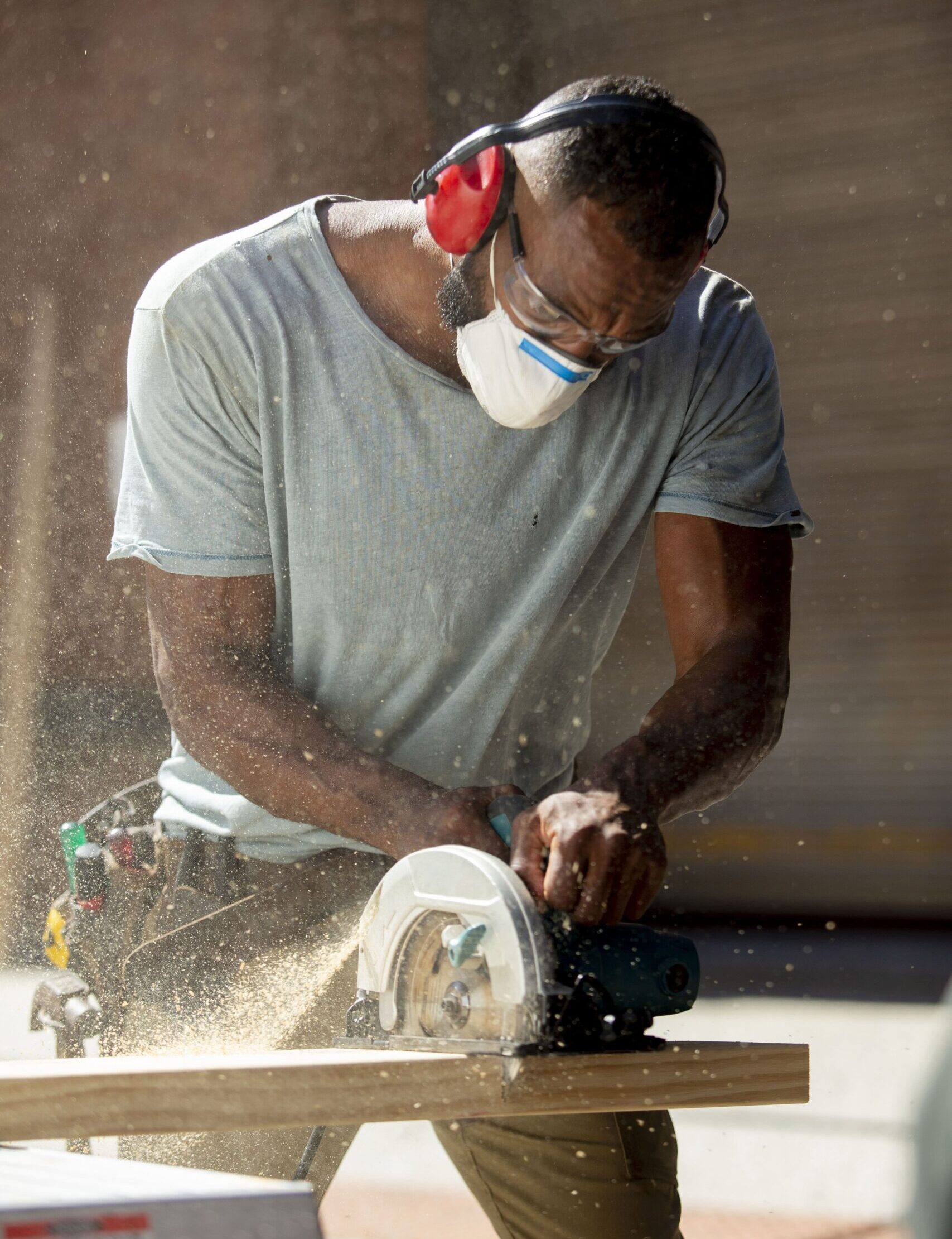 male carpenter woodworking