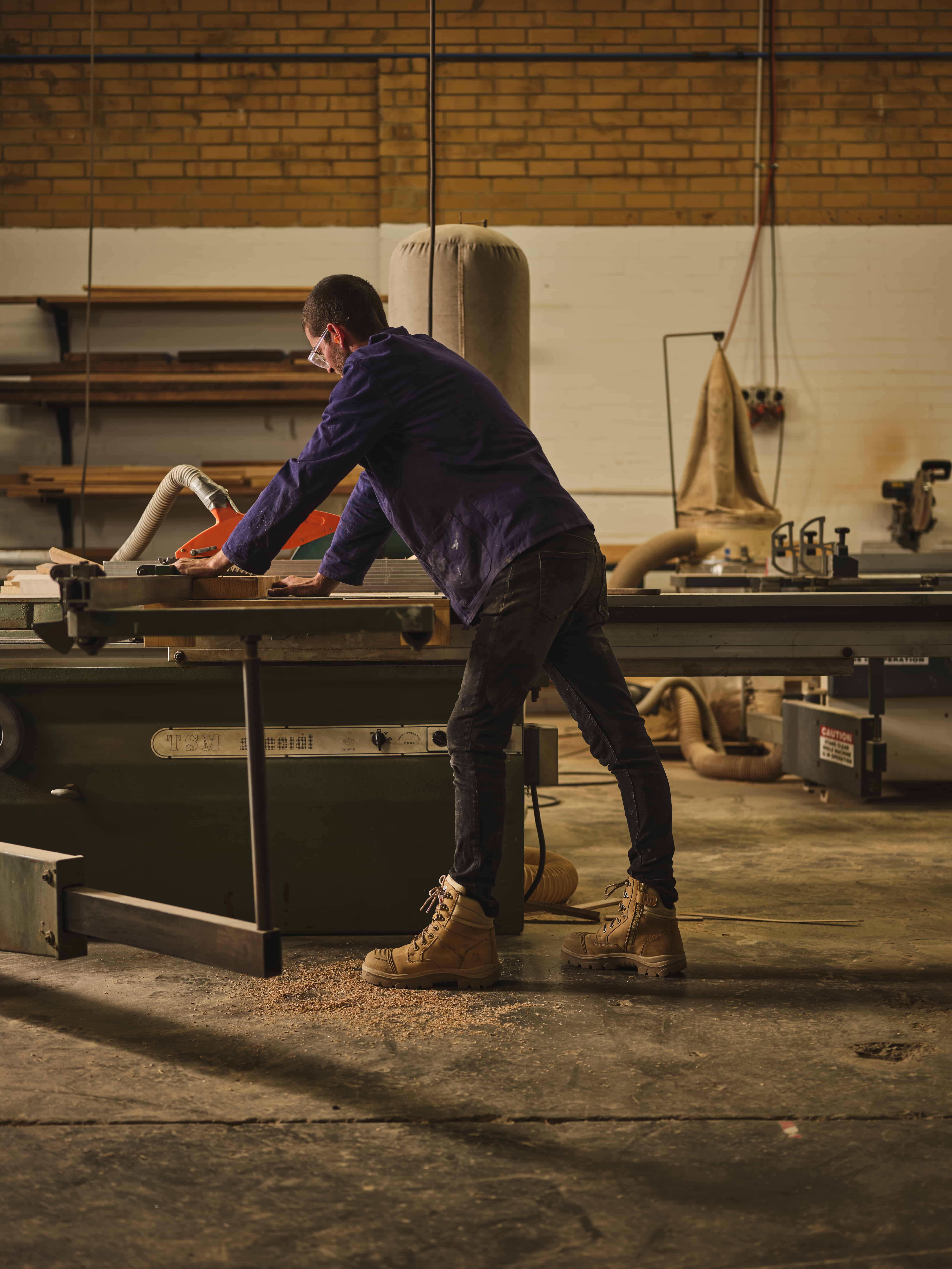 steel blue work boots worn by tradie