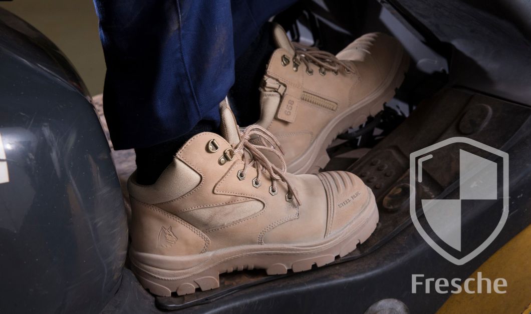 steel blue work boots worn by worker