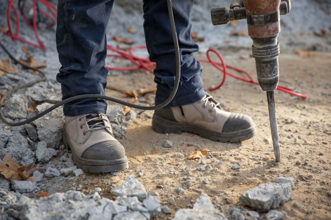 Grey boots with black steel caps