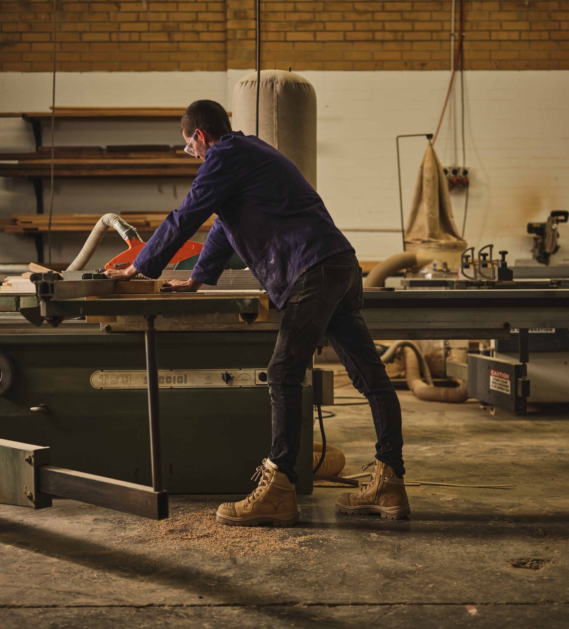 steel blue work boots worn by tradie